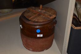 A vintage earthenware bread crock.