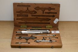 A vintage mahogany cased Draughstmens set.