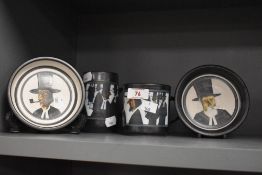 Four items of Ambleside pottery, including pin dishes and mugs.