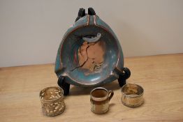 A Doulton Lambeth cabinet cup, having Hallmarked silver cuff, two Hallmarked silver napkin rings and