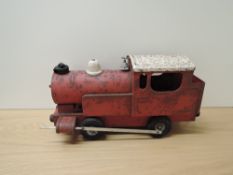 A Triang tin plate 0-4-0 Locomotive in red with white roof