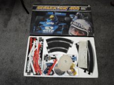 A C587 Scalextric 400 Electric Model Racing Set comprising, Formula One Racing Car x2, Controller