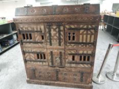 A Victorian Pine Dolls House appears to have been converted from a Cupboard, in the German style