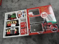 A LGB 70402 G Scale Train Set comprising, 0-4-0 Loco, two Carriages, Figures and boxed Track