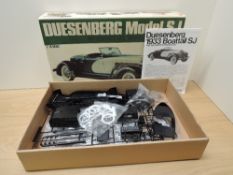 A Bandai 8027 1:16 scale Plastic Kit, Duesenberg Model SJ Speedster 1933 in black, not checked for