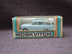 A Moskvitch 1:43 scale diecast, Saloon Car in light blue with white interior, in original window