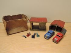 A Marke Lehmann DRGM GNOM tin plate Garage containing two nr 807 Cars, one blue and one ed along