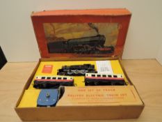A Palitoy 0 gauge Safety Electric Train Set comprising, BR 2-6-2 Tank Locomotive with two Carriages,