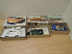 Three mixed scale plastic Kits, Airfix 1:24 Aston Martin DB6, Airfix 32nd Maserati Indy and MPC 1:25