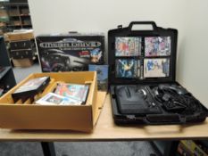 A Sega Mega Drive 16-Bit Console with two controllers and power leads in original fitted hard