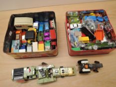 Two small boxes of playworn diecasts including Britains David Brown Tractor, Matchbox Adventure 2000