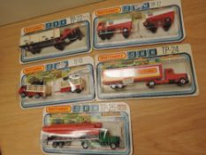 Five 1978 Matchbox 900 diecast sets, TP17 Chevron Tanker & Trailer, TP19 Cattle Truck & Trailer both