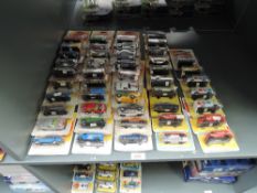 A large collection of 1970's Corgi diecasts including No8 Police Range Rover, No10 Triumph TR7, No92