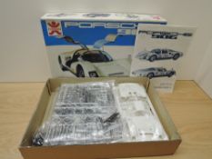 A Bandai 8047 1:16 scale Plastic Kit, Porsche 906 in white, not checked for completeness, appears