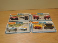 Four 1978 Matchbox 900 diecast sets, TP17 Chevron Trailer Tanks, TP18 Golf with Boat Trailer Sea