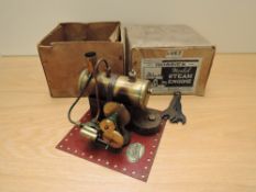 A Hobbies No SE2 Live Steam stationary Single Cylinder Engine having copper boiler and burner