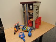A 1980's Columbia Pictures Ghostbusters Fire Station Headquarters along with similar Helicopter,