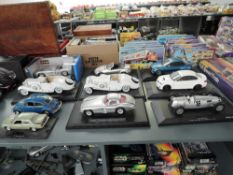Ten 1:18 and similar scale diecasts, Burago Mercedes Benz 300 SLR MM 1955 boxed, Maisto Mercedes