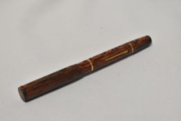 A Mabie Todd Swan SF2 lever fill fountain pen in black and red with two bands to the barrel having