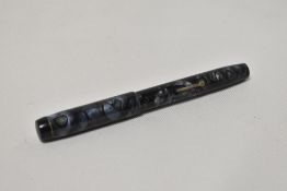 A Conway Stewart 479 the Universal pen lever fill fountain pen in blue black marble having Conway