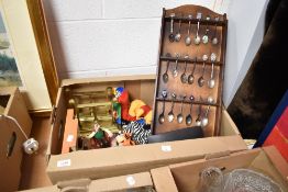 A pair of brass fire dogs, a collection of teaspoons with display stand, five assorted ty Beanie
