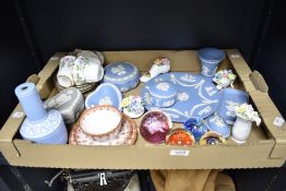 Three Caithness paperweights and another similar, a collection of eight pieces of Jasperware,