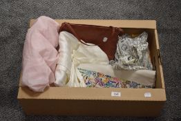 Three vintage ladies underslips, two ladies wool jumpers and a blouse, a small leather handbag and