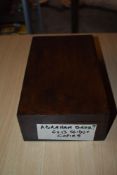 Mountaineering. A small lift-top wooden case containing 87 card-framed photographic slides copied