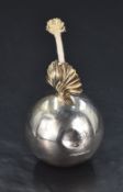 A Victorian silver 'Flaming Grenade' table lighter of spherical form with engraved sword wielding