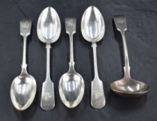 A group of four late Victorian fiddle pattern dessert spoons, engraved with Demi lion crest and with