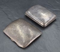 An Edwardian silver cigarette case, of hinged rectangular form and curved for the gentleman's