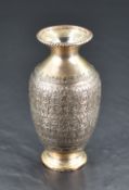 An interesting Persian white metal vase, having short flared neck over a body engraved with