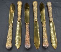 A set of six Queen Elizabeth II silver gilt dessert knives, having shaped blades, cast fruiting vine