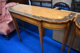 A nice quality reproduction satinwood console table having painted nasturtium detail on square