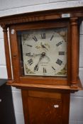 A traditional oak cased long case clock of nice proportions having 30 hour movement with painted