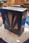 A vintage Redifusion wireless radio or speaker cabinet