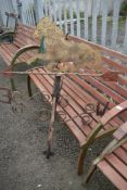 A metal weather vane, modelled as a horse