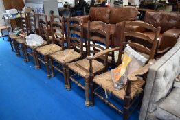 Seven (six plus one) rush seated ladder back chairs