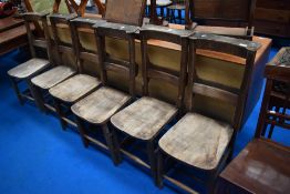 A set of six chapel chairs