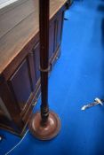A traditional mahogany standard lamp