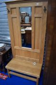 A bespoke golden oak hall stand having GWR stamped to coat hooks