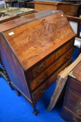 An early to mid 20th Century walnut bureau