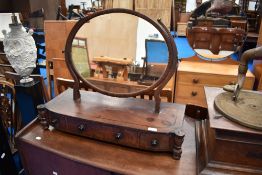 A 19th Century mahogany toilet mirror having drawer base