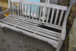 A traditional teak garden bench made from the timber of the yacht Enchantress, approx 168cm