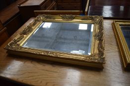 A gilt frame wall mirror, approx. 65 x 55cm