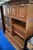 A vintage oak Continental style side cabinet of interesting design