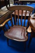 An early to mid 20th Century office armchair