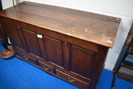 A period oak kist having later adaptations including drop panels to front , dimensions approx.