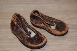 A pair of Victorian leather children's shoes
