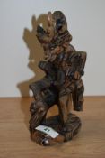 A Continental zebra wood carved figure of the Hanuman deity, measuring 22cm tall